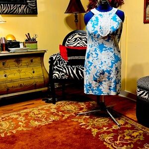 pretty sleeveless dress. Beautiful detail around the neck and front of dress